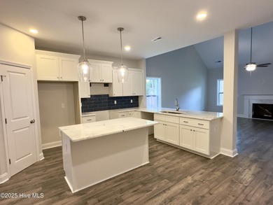 This stunning new 4-bedroom, 2.5-bath home in the gated Woodlake on Woodlake Country Club in North Carolina - for sale on GolfHomes.com, golf home, golf lot