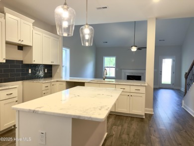 This stunning new 4-bedroom, 2.5-bath home in the gated Woodlake on Woodlake Country Club in North Carolina - for sale on GolfHomes.com, golf home, golf lot