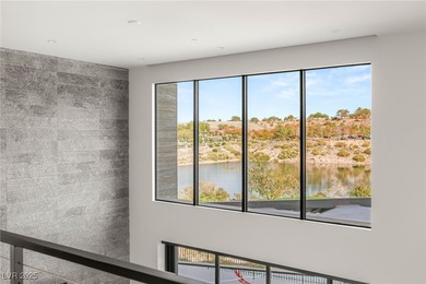 Built by Blue Heron, this modern architectural masterpiece in on Rio Secco Golf Club in Nevada - for sale on GolfHomes.com, golf home, golf lot