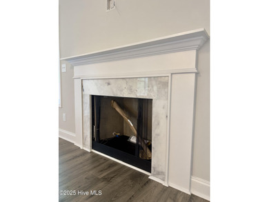 This stunning new 4-bedroom, 2.5-bath home in the gated Woodlake on Woodlake Country Club in North Carolina - for sale on GolfHomes.com, golf home, golf lot