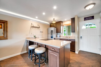 Air-Conditioned Halelani Village Unit with Beautiful Mountain on Puakea Golf Course in Hawaii - for sale on GolfHomes.com, golf home, golf lot