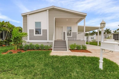 TOTALLY MODERN & OPEN DESIGN WITH HIGH CEILINGS AND PERFECT on Royal Wood Golf and Country Club in Florida - for sale on GolfHomes.com, golf home, golf lot