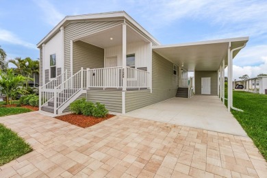 TOTALLY MODERN & OPEN DESIGN WITH HIGH CEILINGS AND PERFECT on Royal Wood Golf and Country Club in Florida - for sale on GolfHomes.com, golf home, golf lot