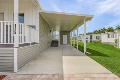 TOTALLY MODERN & OPEN DESIGN WITH HIGH CEILINGS AND PERFECT on Royal Wood Golf and Country Club in Florida - for sale on GolfHomes.com, golf home, golf lot