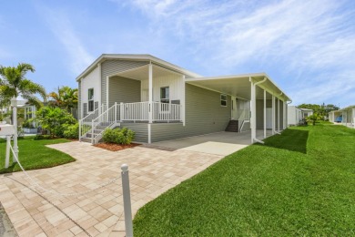 TOTALLY MODERN & OPEN DESIGN WITH HIGH CEILINGS AND PERFECT on Royal Wood Golf and Country Club in Florida - for sale on GolfHomes.com, golf home, golf lot