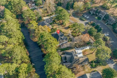 Nestled within the prestigious River Club community in Pawleys on River Club in South Carolina - for sale on GolfHomes.com, golf home, golf lot