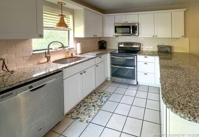 HUTCHINSON ISLAND PARADISE WITH DEEDED OCEAN ACCESS, JUST STEPS on Island Dunes Country Club in Florida - for sale on GolfHomes.com, golf home, golf lot