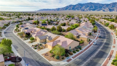 Nestled in the vibrant and welcoming 55+ community of Sun City on Aliante Golf Club in Nevada - for sale on GolfHomes.com, golf home, golf lot