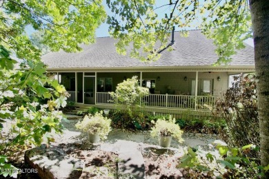 Have your morning coffee on the 54.5' x 11.5' screened porch on Toqua Golf Course - Loudon County in Tennessee - for sale on GolfHomes.com, golf home, golf lot