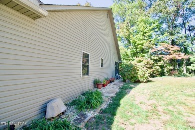 Have your morning coffee on the 54.5' x 11.5' screened porch on Toqua Golf Course - Loudon County in Tennessee - for sale on GolfHomes.com, golf home, golf lot