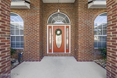 Situated in the highly sought-after Fleming Island Plantation on Golf Club At Fleming Island in Florida - for sale on GolfHomes.com, golf home, golf lot