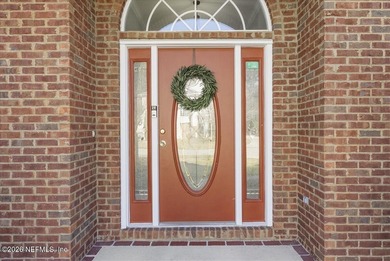 Situated in the highly sought-after Fleming Island Plantation on Golf Club At Fleming Island in Florida - for sale on GolfHomes.com, golf home, golf lot