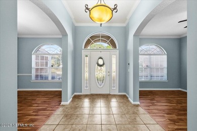 Situated in the highly sought-after Fleming Island Plantation on Golf Club At Fleming Island in Florida - for sale on GolfHomes.com, golf home, golf lot