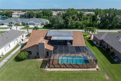 SPACIOUS POOL HOME OVERLOOKING GOLF COURSE IN LAKE SUZY on Kingsway Country Club in Florida - for sale on GolfHomes.com, golf home, golf lot