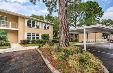 Fore!! Your Dunedin dream is within range. Grab your golf cart on The Dunedin Country Club in Florida - for sale on GolfHomes.com, golf home, golf lot