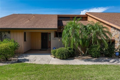 SPACIOUS POOL HOME OVERLOOKING GOLF COURSE IN LAKE SUZY on Kingsway Country Club in Florida - for sale on GolfHomes.com, golf home, golf lot