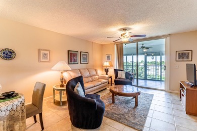 Spectacular lake views abound in this waterfront condominium on Marina Lakes Golf Course in Florida - for sale on GolfHomes.com, golf home, golf lot