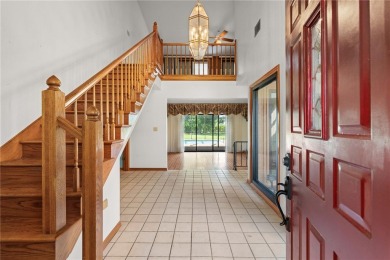 SPACIOUS POOL HOME OVERLOOKING GOLF COURSE IN LAKE SUZY on Kingsway Country Club in Florida - for sale on GolfHomes.com, golf home, golf lot