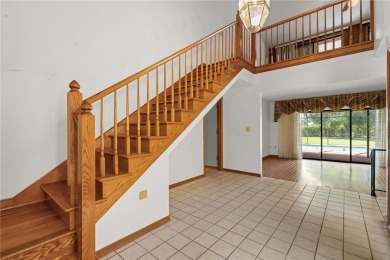 SPACIOUS POOL HOME OVERLOOKING GOLF COURSE IN LAKE SUZY on Kingsway Country Club in Florida - for sale on GolfHomes.com, golf home, golf lot