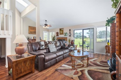 This exceptional end-unit townhome is strategically located on on The Grand Club - Pine Lakes Course in Florida - for sale on GolfHomes.com, golf home, golf lot
