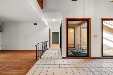 SPACIOUS POOL HOME OVERLOOKING GOLF COURSE IN LAKE SUZY on Kingsway Country Club in Florida - for sale on GolfHomes.com, golf home, golf lot