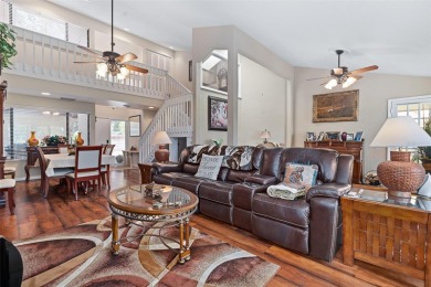 This exceptional end-unit townhome is strategically located on on The Grand Club - Pine Lakes Course in Florida - for sale on GolfHomes.com, golf home, golf lot
