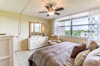 Spectacular lake views abound in this waterfront condominium on Marina Lakes Golf Course in Florida - for sale on GolfHomes.com, golf home, golf lot