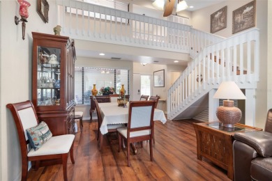 This exceptional end-unit townhome is strategically located on on The Grand Club - Pine Lakes Course in Florida - for sale on GolfHomes.com, golf home, golf lot