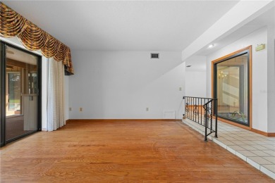 SPACIOUS POOL HOME OVERLOOKING GOLF COURSE IN LAKE SUZY on Kingsway Country Club in Florida - for sale on GolfHomes.com, golf home, golf lot