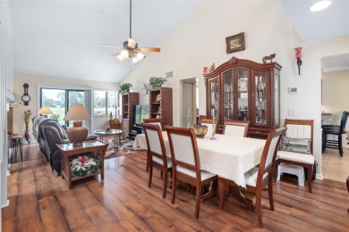 This exceptional end-unit townhome is strategically located on on The Grand Club - Pine Lakes Course in Florida - for sale on GolfHomes.com, golf home, golf lot