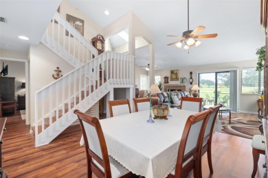 This exceptional end-unit townhome is strategically located on on The Grand Club - Pine Lakes Course in Florida - for sale on GolfHomes.com, golf home, golf lot