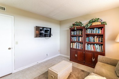 Spectacular lake views abound in this waterfront condominium on Marina Lakes Golf Course in Florida - for sale on GolfHomes.com, golf home, golf lot