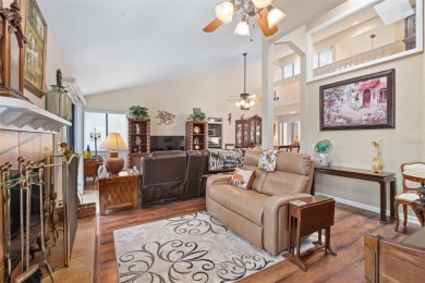 This exceptional end-unit townhome is strategically located on on The Grand Club - Pine Lakes Course in Florida - for sale on GolfHomes.com, golf home, golf lot