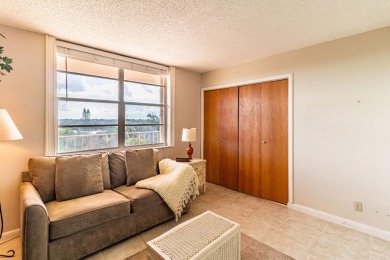 Spectacular lake views abound in this waterfront condominium on Marina Lakes Golf Course in Florida - for sale on GolfHomes.com, golf home, golf lot