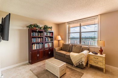 Spectacular lake views abound in this waterfront condominium on Marina Lakes Golf Course in Florida - for sale on GolfHomes.com, golf home, golf lot