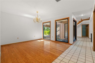 SPACIOUS POOL HOME OVERLOOKING GOLF COURSE IN LAKE SUZY on Kingsway Country Club in Florida - for sale on GolfHomes.com, golf home, golf lot