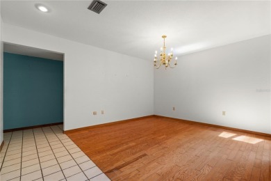 SPACIOUS POOL HOME OVERLOOKING GOLF COURSE IN LAKE SUZY on Kingsway Country Club in Florida - for sale on GolfHomes.com, golf home, golf lot