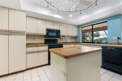 SPACIOUS POOL HOME OVERLOOKING GOLF COURSE IN LAKE SUZY on Kingsway Country Club in Florida - for sale on GolfHomes.com, golf home, golf lot