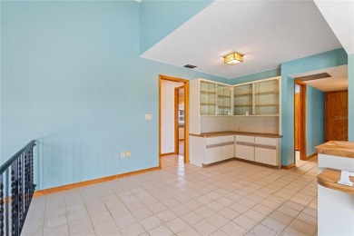 SPACIOUS POOL HOME OVERLOOKING GOLF COURSE IN LAKE SUZY on Kingsway Country Club in Florida - for sale on GolfHomes.com, golf home, golf lot
