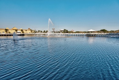 Wake up to serene lake views and step into the heart of on Signal Hill Golf Course, Inc. in Florida - for sale on GolfHomes.com, golf home, golf lot