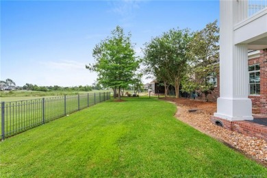 Elegant golf course home situated on just under  3/4  of an acre on Gray Plantation Golf Course in Louisiana - for sale on GolfHomes.com, golf home, golf lot