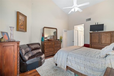 This exceptional end-unit townhome is strategically located on on The Grand Club - Pine Lakes Course in Florida - for sale on GolfHomes.com, golf home, golf lot