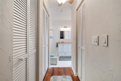 This exceptional end-unit townhome is strategically located on on The Grand Club - Pine Lakes Course in Florida - for sale on GolfHomes.com, golf home, golf lot