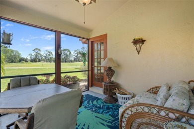 This exceptional end-unit townhome is strategically located on on The Grand Club - Pine Lakes Course in Florida - for sale on GolfHomes.com, golf home, golf lot