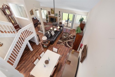 This exceptional end-unit townhome is strategically located on on The Grand Club - Pine Lakes Course in Florida - for sale on GolfHomes.com, golf home, golf lot
