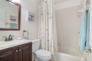 This exceptional end-unit townhome is strategically located on on The Grand Club - Pine Lakes Course in Florida - for sale on GolfHomes.com, golf home, golf lot