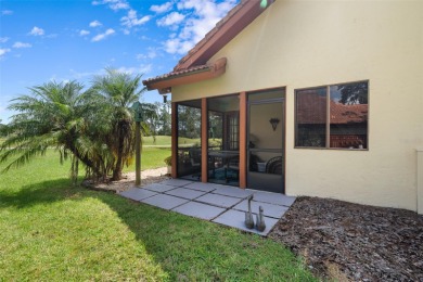 This exceptional end-unit townhome is strategically located on on The Grand Club - Pine Lakes Course in Florida - for sale on GolfHomes.com, golf home, golf lot