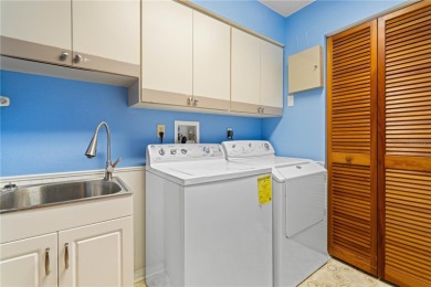 SPACIOUS POOL HOME OVERLOOKING GOLF COURSE IN LAKE SUZY on Kingsway Country Club in Florida - for sale on GolfHomes.com, golf home, golf lot