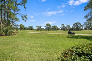 This exceptional end-unit townhome is strategically located on on The Grand Club - Pine Lakes Course in Florida - for sale on GolfHomes.com, golf home, golf lot