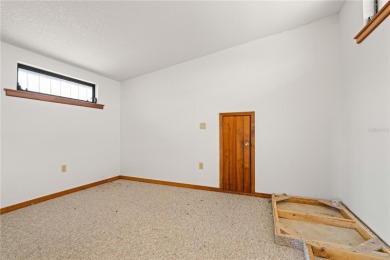 SPACIOUS POOL HOME OVERLOOKING GOLF COURSE IN LAKE SUZY on Kingsway Country Club in Florida - for sale on GolfHomes.com, golf home, golf lot